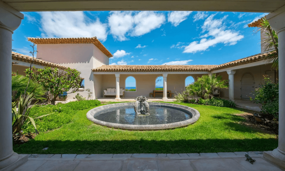 Scenic coastal panorama from villa grounds in Les Parcs
